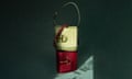 A still life image of two different bucket bags stacked on top of each other.