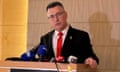 Gideon Sa'ar speaks as he stands behind a lectern