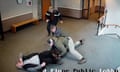 Federal agents tackling a man to the ground, as a fallen bystander lies in pain