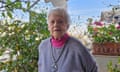 Lola Hassid Angel surrounded by plants on a sunny terrace