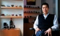 David Liu poses for a picture seated in a room next to shelves featuring what appear to be rock samples and vintage camera equipment