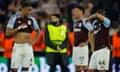Ezri Konsa and Aston Villa react as the full-time whistle signals their Champions League exit.
