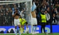 Aston Villa players react to a PSG goal.