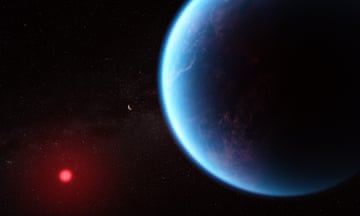 An illustration of what the planet K2-18 b could look like with a red dwarf star on a black background that is speckled with some small stars. The planet is large, in the foreground on the right and the star is smaller, in the background at the lower left. The planet is various shades of blue, with wisps of white scattered throughout. The left edge of the planet (the side facing the star) is lit, while the rest is in shadow. The star has a bright red glow.]
