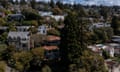 aerial view of various homes and trees