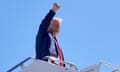 Donald Trump raising his fist in the air