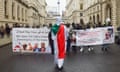 Protesters in the street outside the Foreign Office in London.