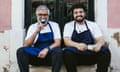 two chefs laughing and drinking on steps Pigmeu restaurant in Lisbon