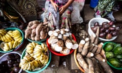 Bowls of fruit and vegetables at a market stall