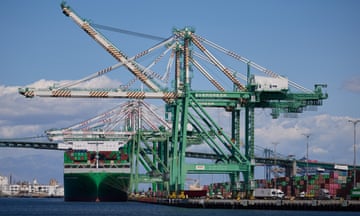 A ship unloads cargo containers at the Port of Los Angeles in California, US