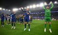 Désiré Doué, Marquinhos and Gianluigi Donnarumma celebrate at full-time following PSG’s win at Aston Villa.