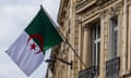 An Algerian flag flies at the embassy in Paris.