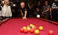 Albanese lines up a pool shot