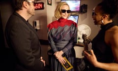 Tom Burke and Cate Blanchett wait in the wings before presenting an award